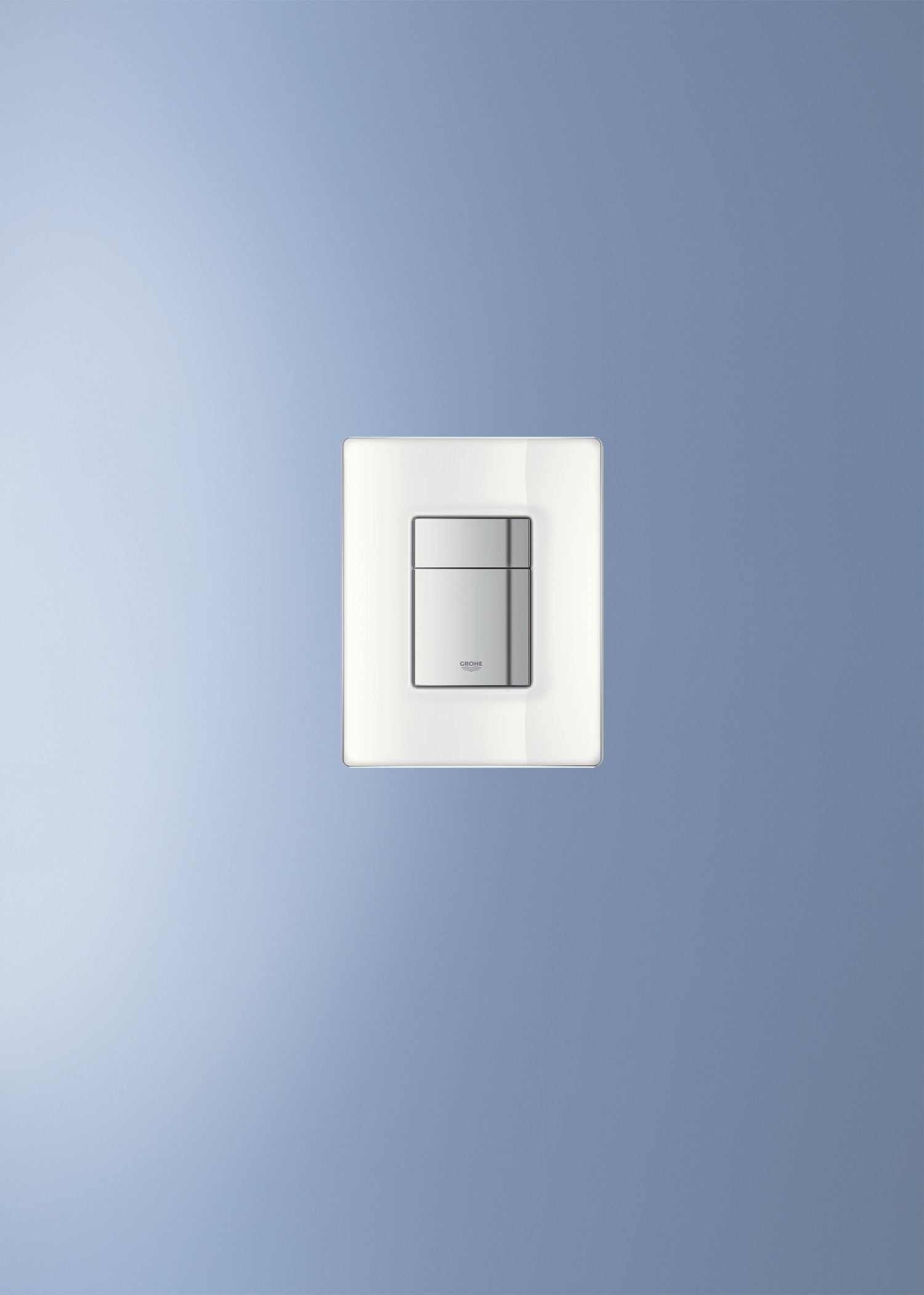 White rectangular wall plate with integrated rectangular button control marked with Grohe branding.
