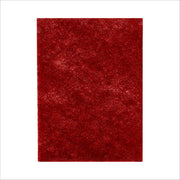 Red abrasive stripping pad with fine granular texture surface.