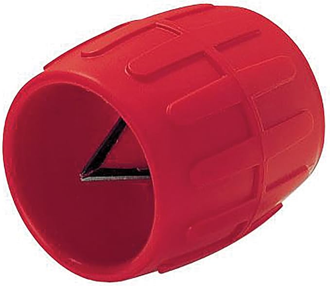 Red cylindrical reamer tool with triangular cutting blade visible inside the hollow end.