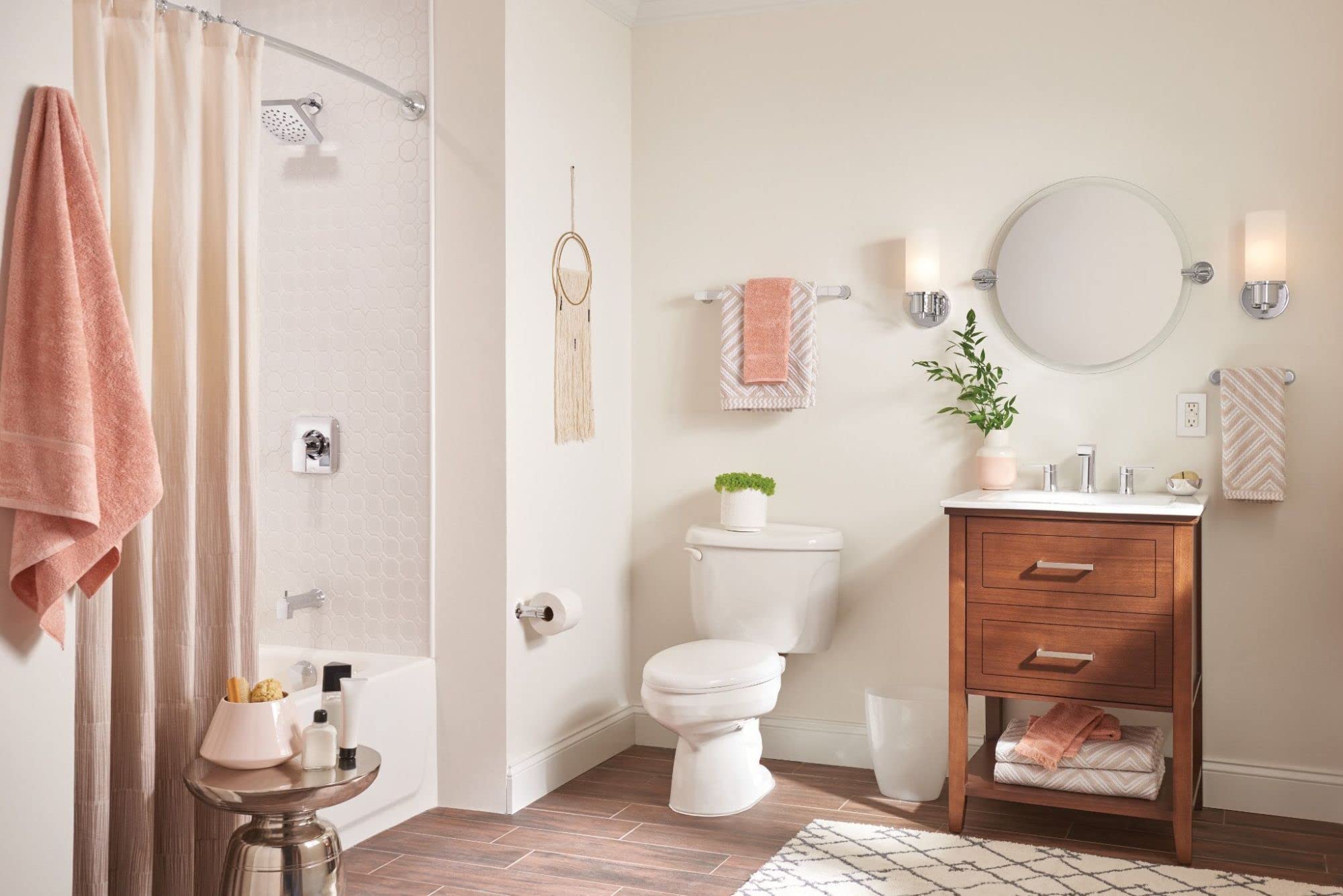 Chrome towel bar mounted horizontally on bathroom wall above toilet area.