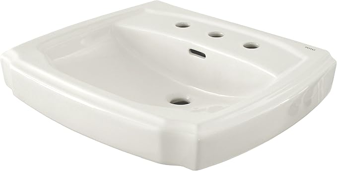 White oval undermount bathroom sink with multiple faucet holes and rounded edges.