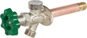 Wall hydrant with green quarter-turn handle, copper tube, and metal valve body with brass fitting.