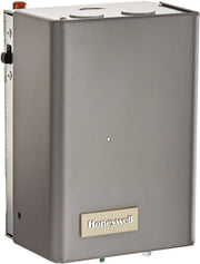 Gray metal Honeywell aquastat relay with copper terminal on top and adjustment dial on side.