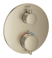 Brushed nickel thermostatic valve trim with two circular handles, temperature gauge marked 38°C/100°F, and Grohe logo on oval