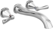 Chrome wall-mounted tub filler with curved spout and three lever handles, one on left side and two on right side.