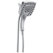 Chrome handheld shower head with multiple spray holes and flexible hose attached.