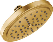 Round brushed gold shower head with multiple spray holes and curved arm connection.