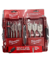 Eight flat boring bits with QUIK-LOK shanks in red Milwaukee packaging, including various bit sizes arranged in clear plastic