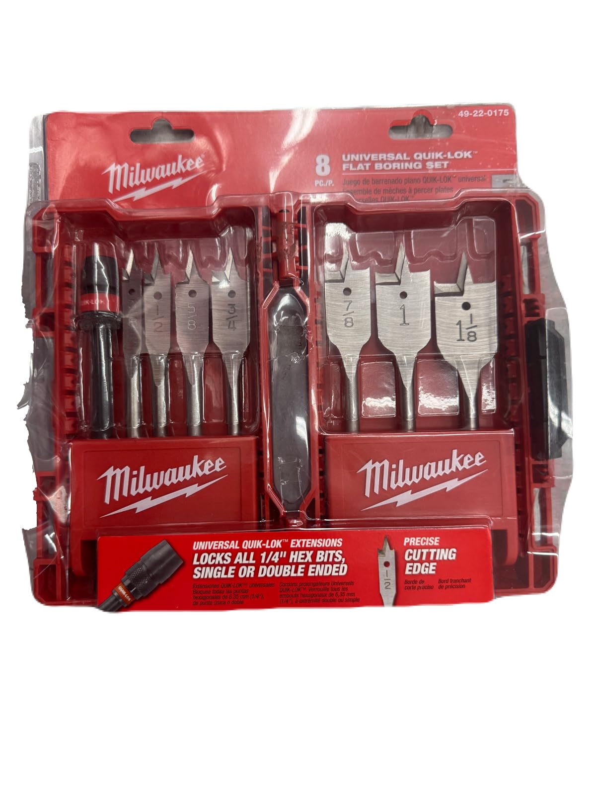 Eight flat boring bits with QUIK-LOK shanks in red Milwaukee packaging, including various bit sizes arranged in clear plastic