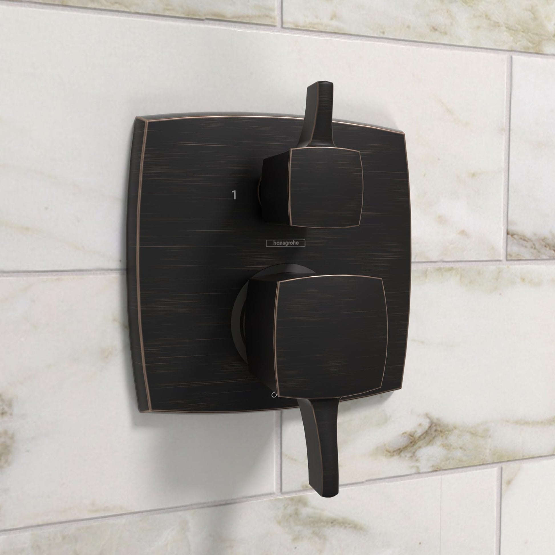 Rubbed bronze square pressure balance valve trim with diverter handle and two rounded control knobs mounted on tile wall.