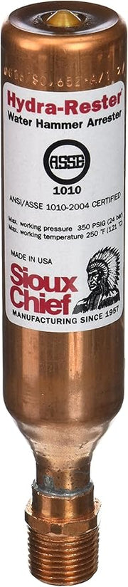 Copper water hammer arrester with white label, brass top fitting, and male threaded connection at base.