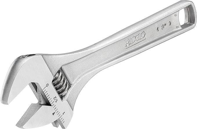 RIDGID chrome adjustable wrench with open jaw and worm gear adjustment mechanism, marked with measurement scale.