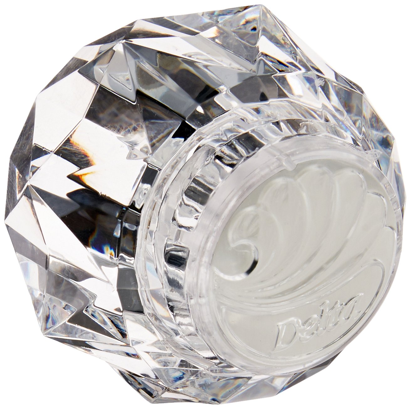 Clear faceted knob handle with chrome finish metal base and Delta branding on circular disc.
