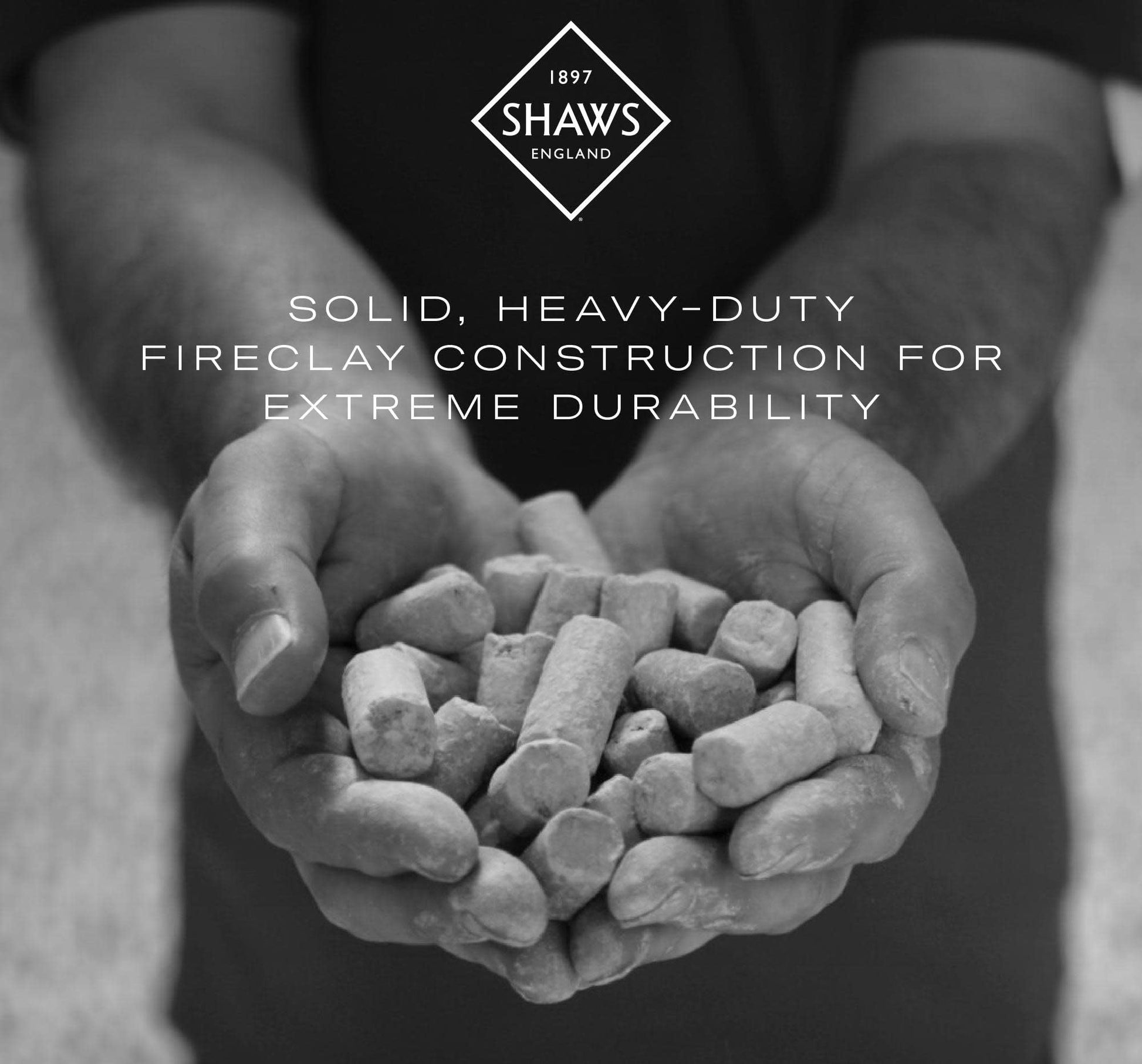 Hands holding fireclay material with Shaws England logo and text about solid heavy-duty fireclay construction.