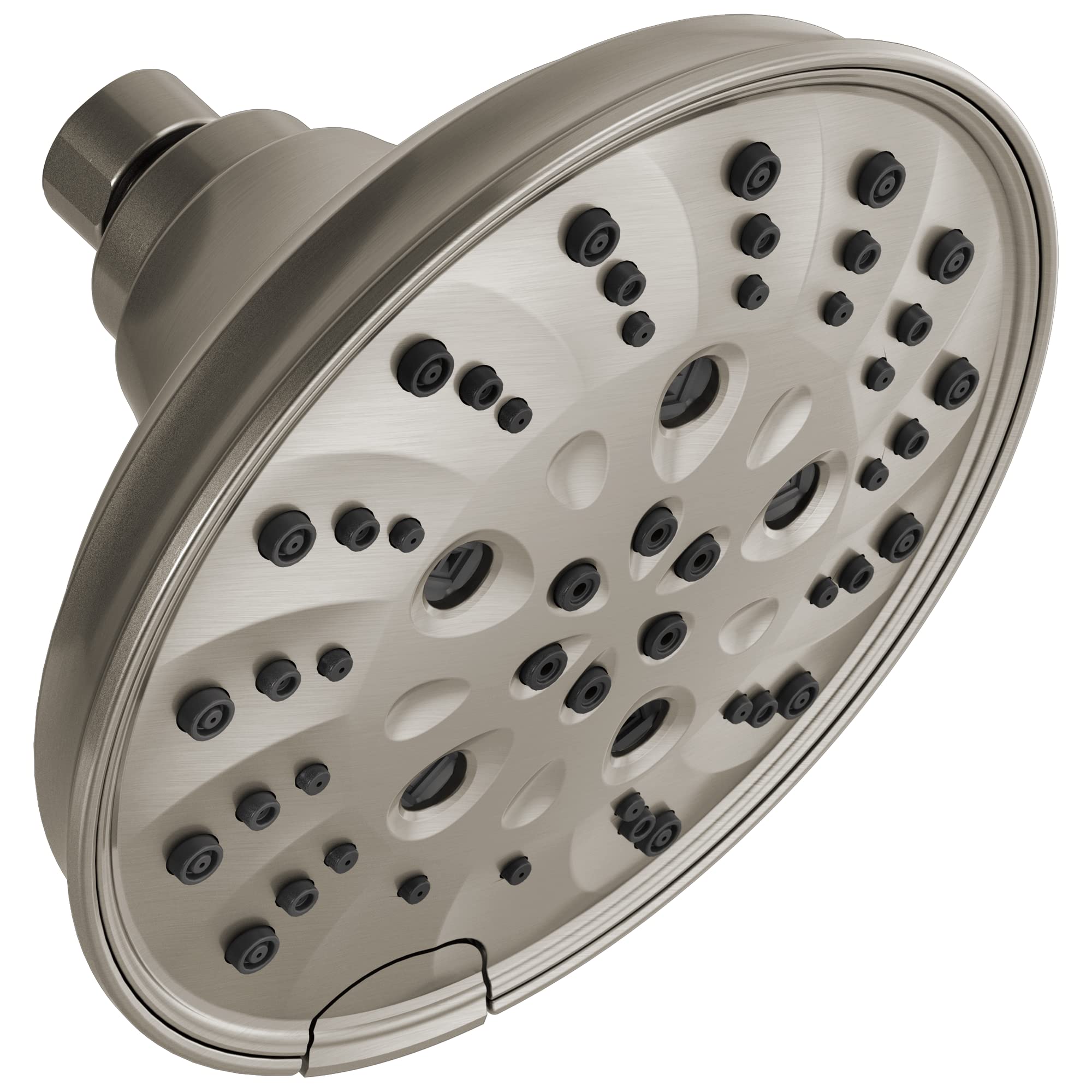 Round brushed nickel shower head with multiple spray jets arranged across cream-colored face plate and cylindrical arm.
