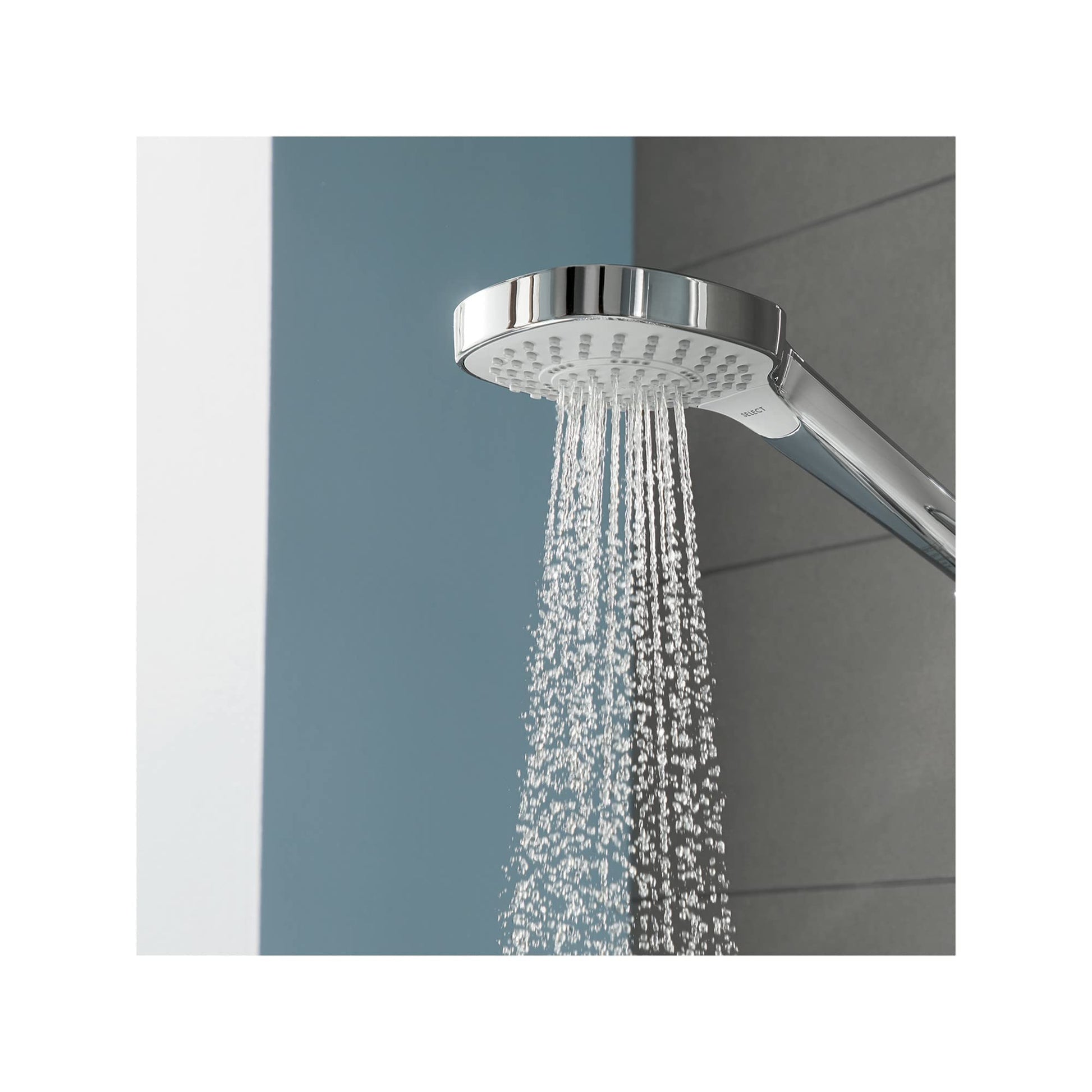 Chrome and white hand shower with circular head dispensing multiple water jets against blue and gray tile background.