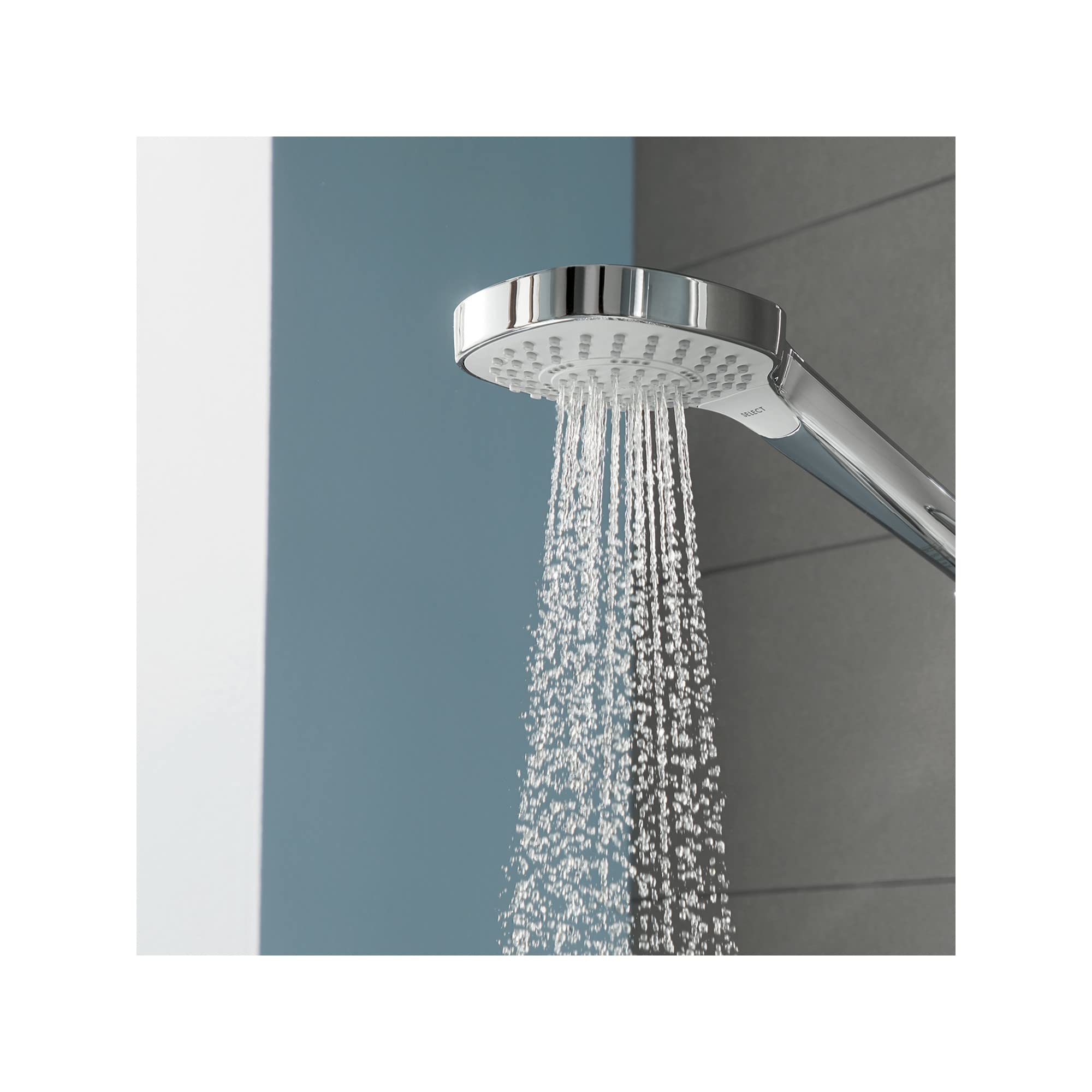 Chrome and white hand shower with circular head dispensing multiple water jets against blue and gray tile background.