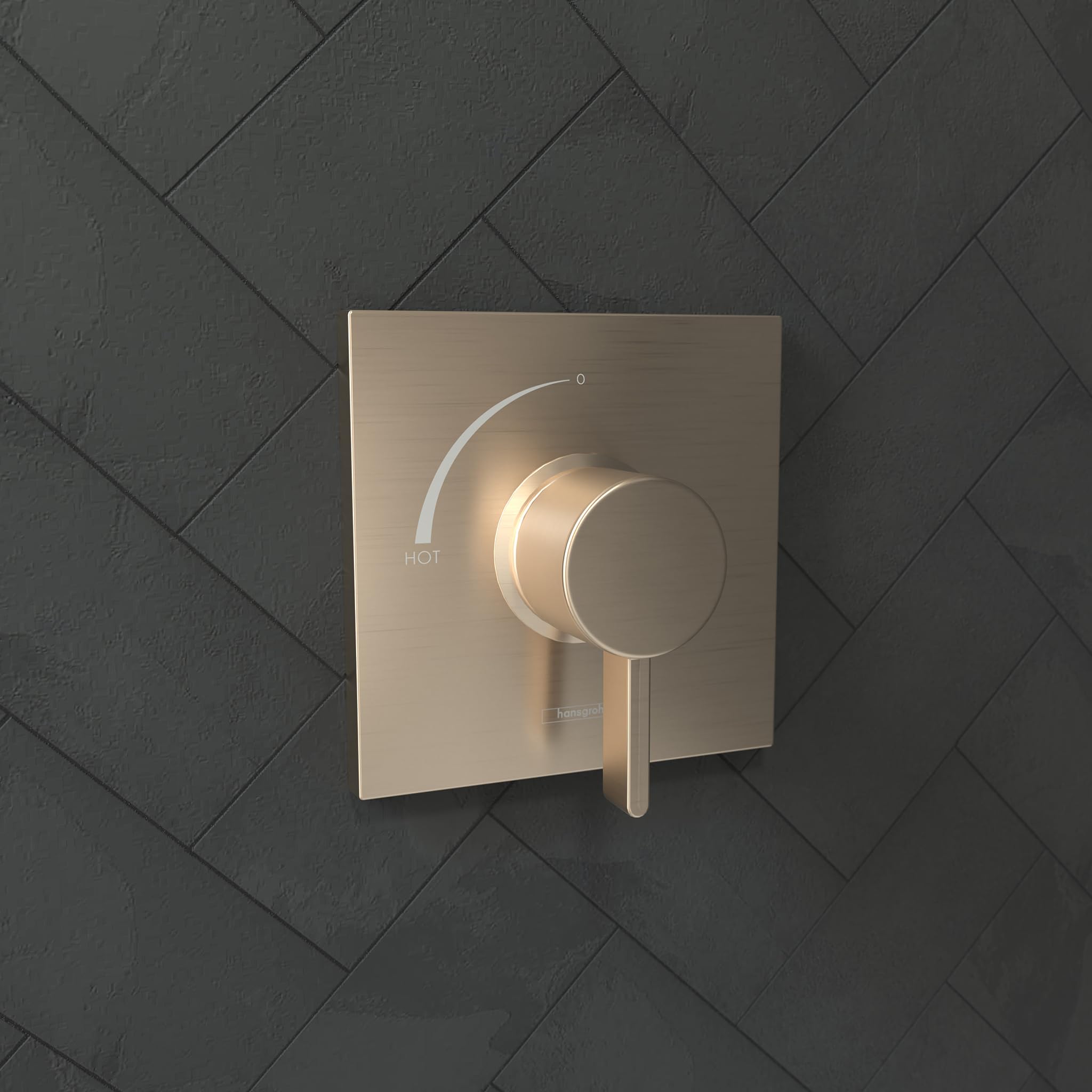 Brushed bronze square pressure balance shower trim with circular handle and temperature dial mounted on tile wall.