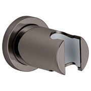 Dark graphite wall-mounted hand shower holder with curved bracket and angled cradle for shower head attachment.