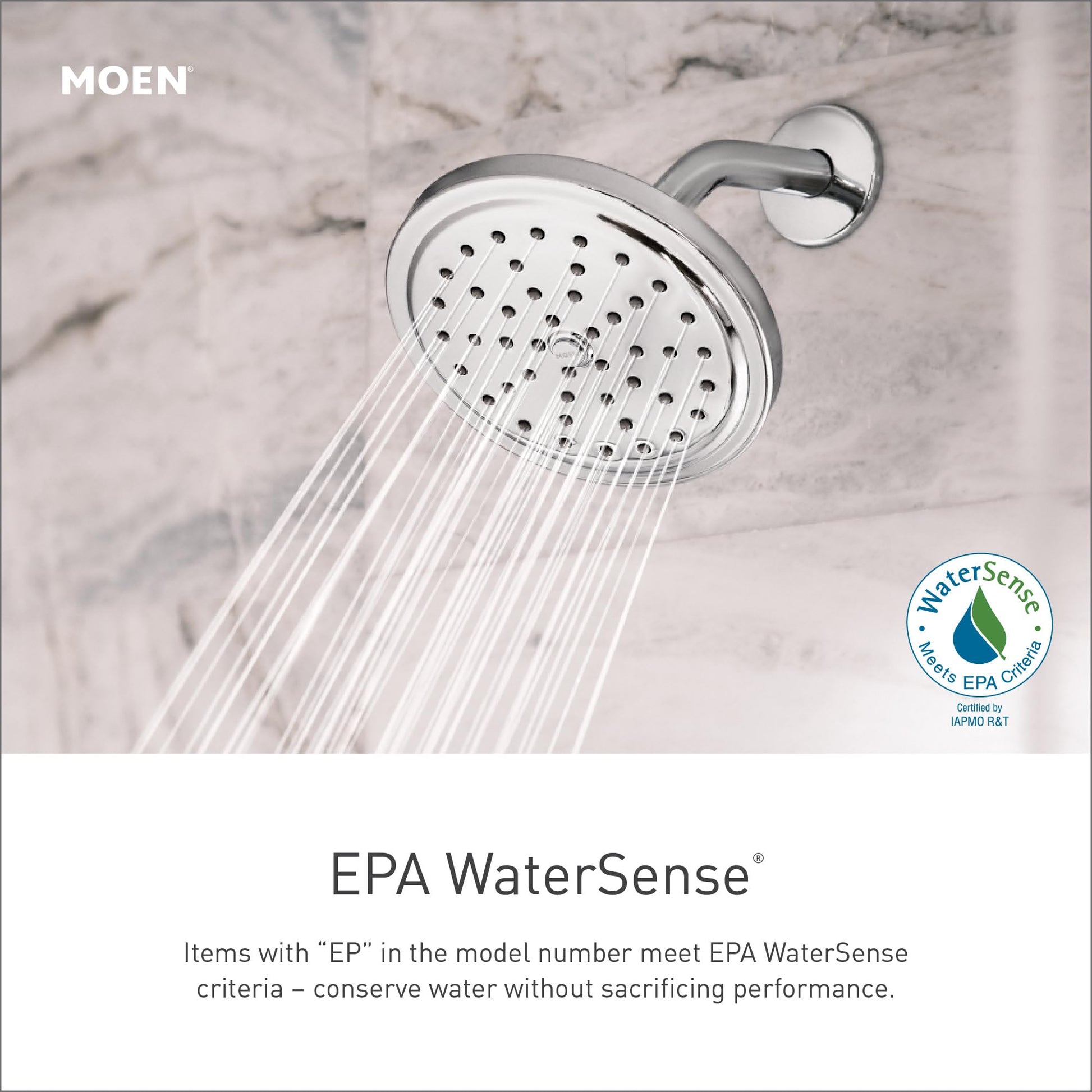 Chrome fixed showerhead with multiple spray holes and curved arm mounted on marble tile wall.