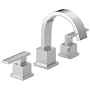 Chrome bathroom faucet with curved spout and two separate square-based handles on either side.