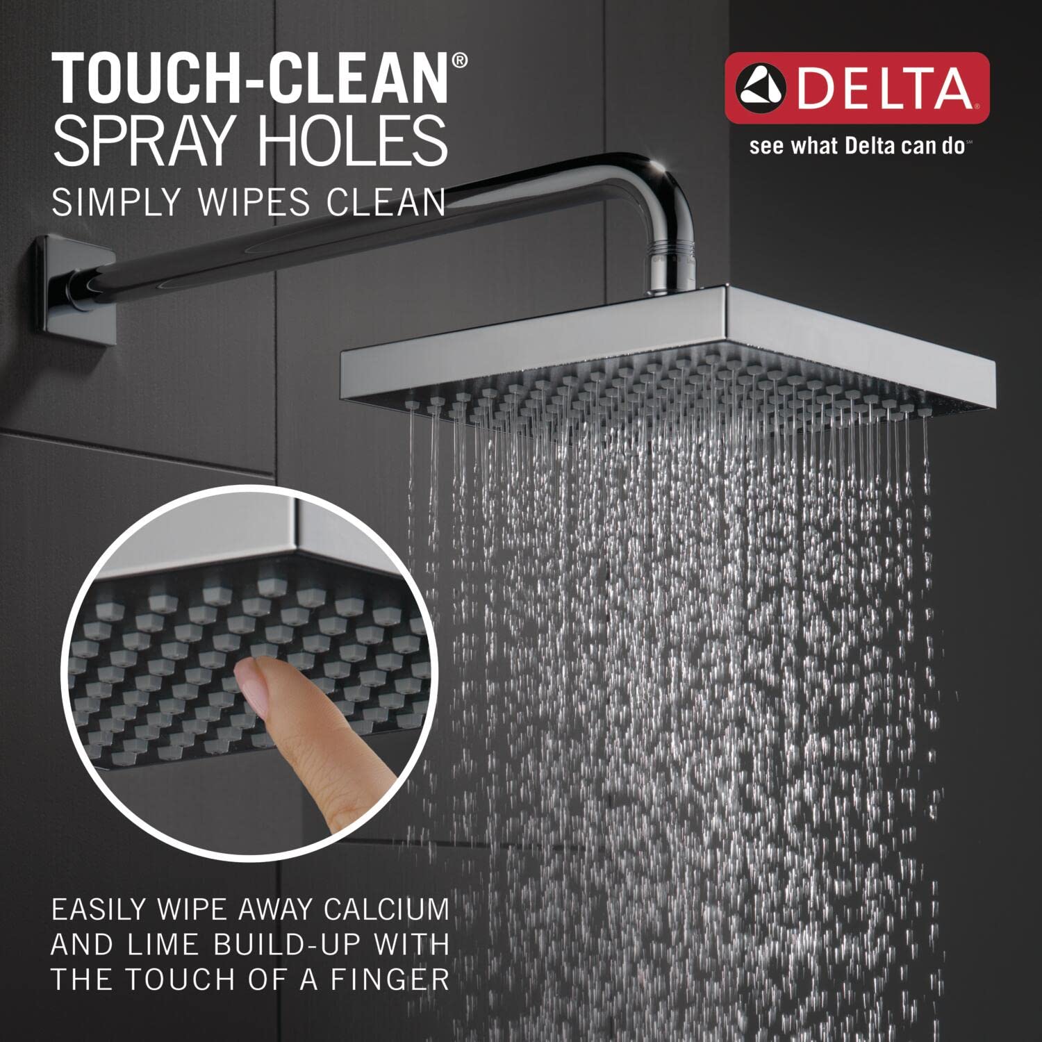 Chrome square raincan shower head mounted on wall with curved arm, featuring multiple spray holes and water streams.