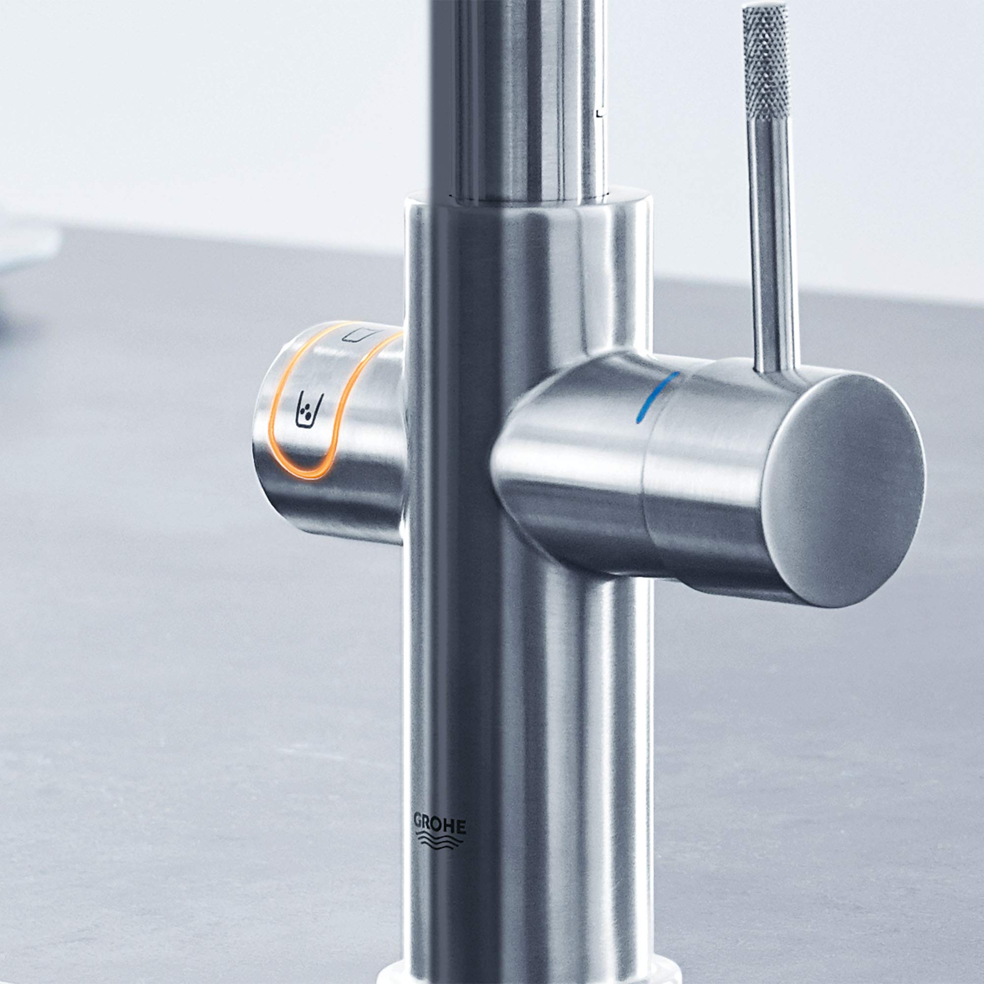Grohe Supersteel single-handle pull-down kitchen faucet with control ring and textured spray head.