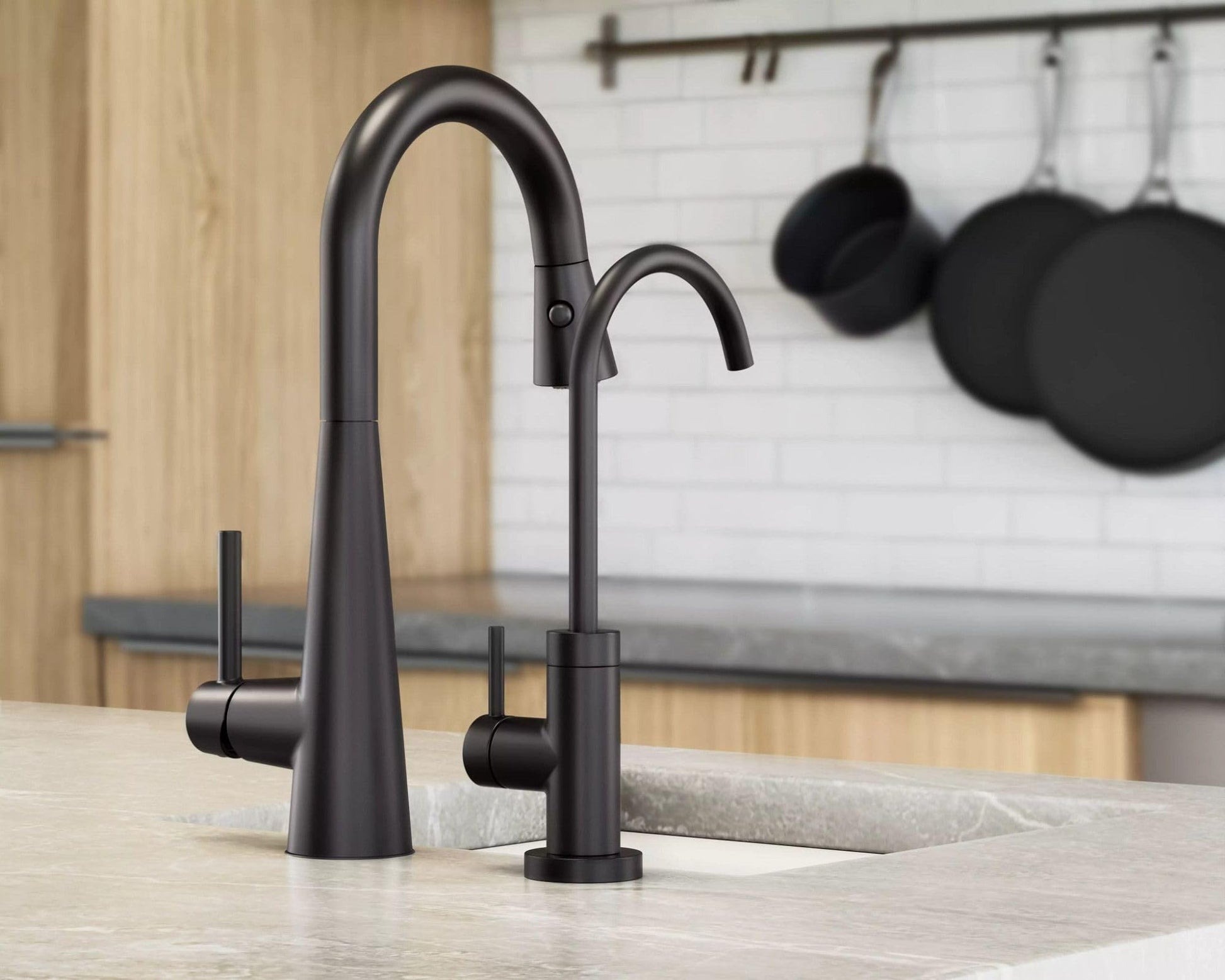 Matte black high arc pulldown bar faucet with single handle mounted on light countertop in kitchen setting.