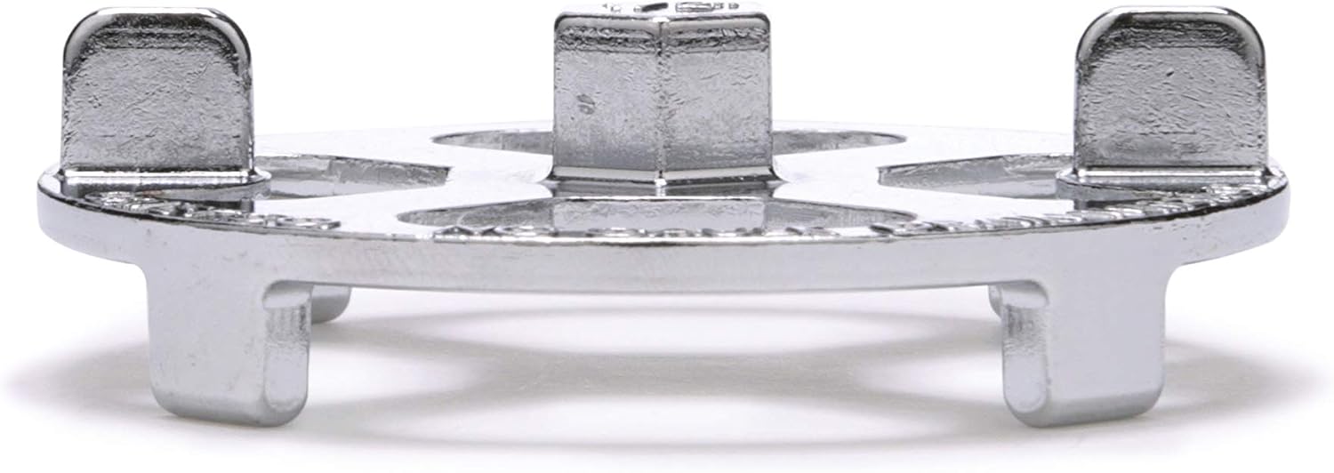 Brass and plastic shower drain wrench with three square sockets and white plastic handles on circular base.