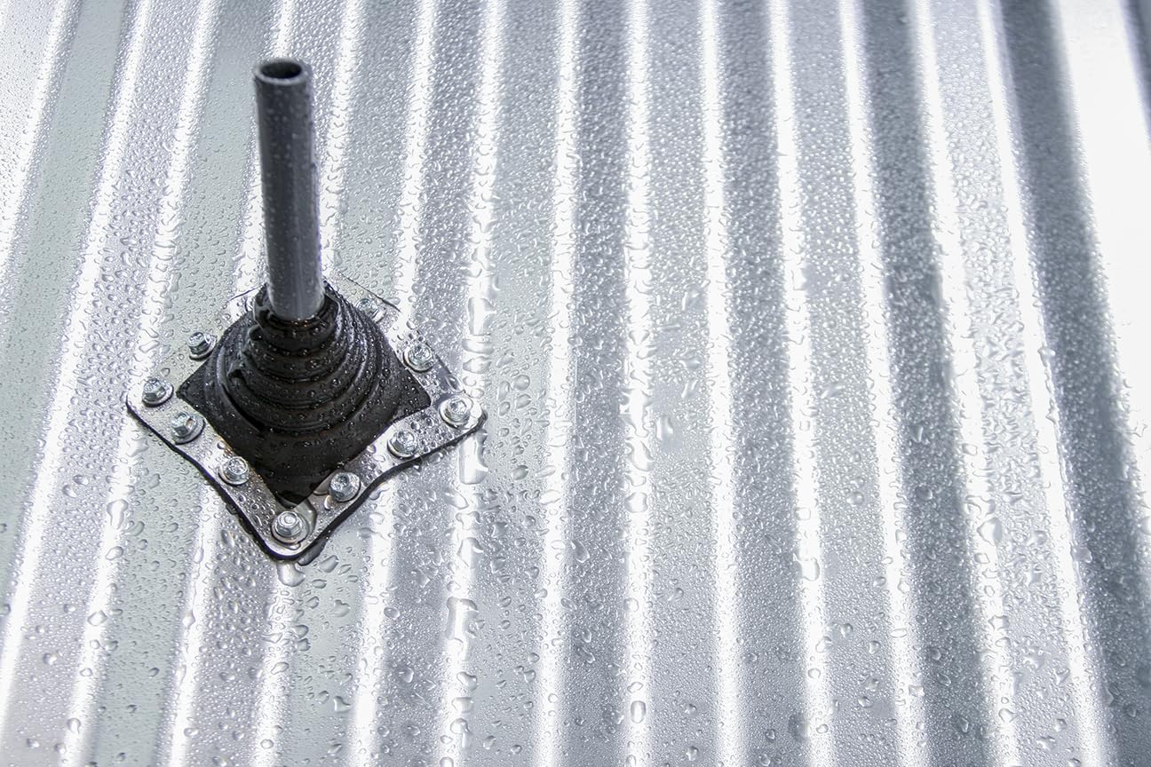 Black roof flashing with cylindrical pipe boot and square metal base installed on corrugated metal roofing.