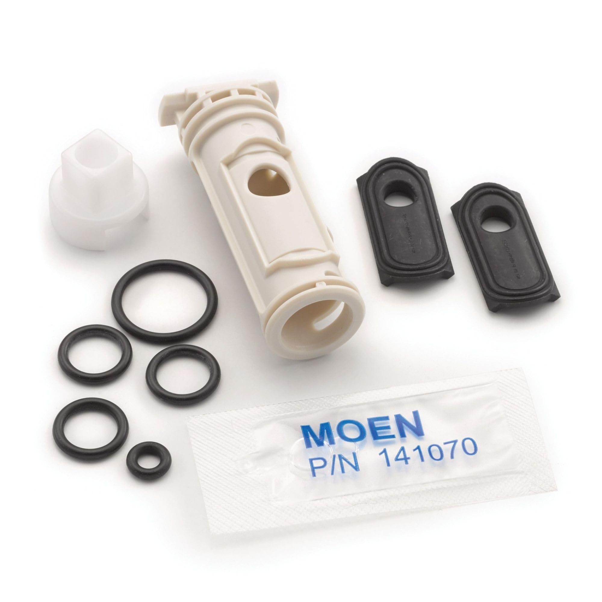Moen cartridge repair kit containing white plastic cartridge, black rubber seals, black gasket pieces, and labeled packet.