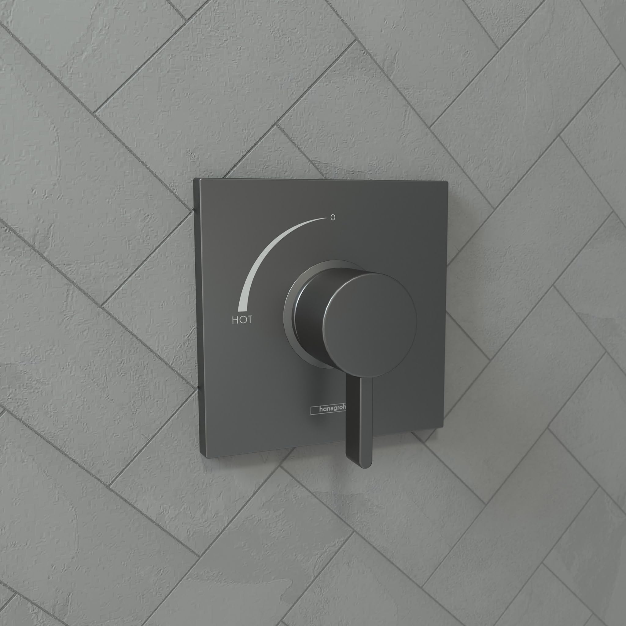 Brushed black chrome square pressure balance trim with circular handle and HOT indicator on herringbone tile background.