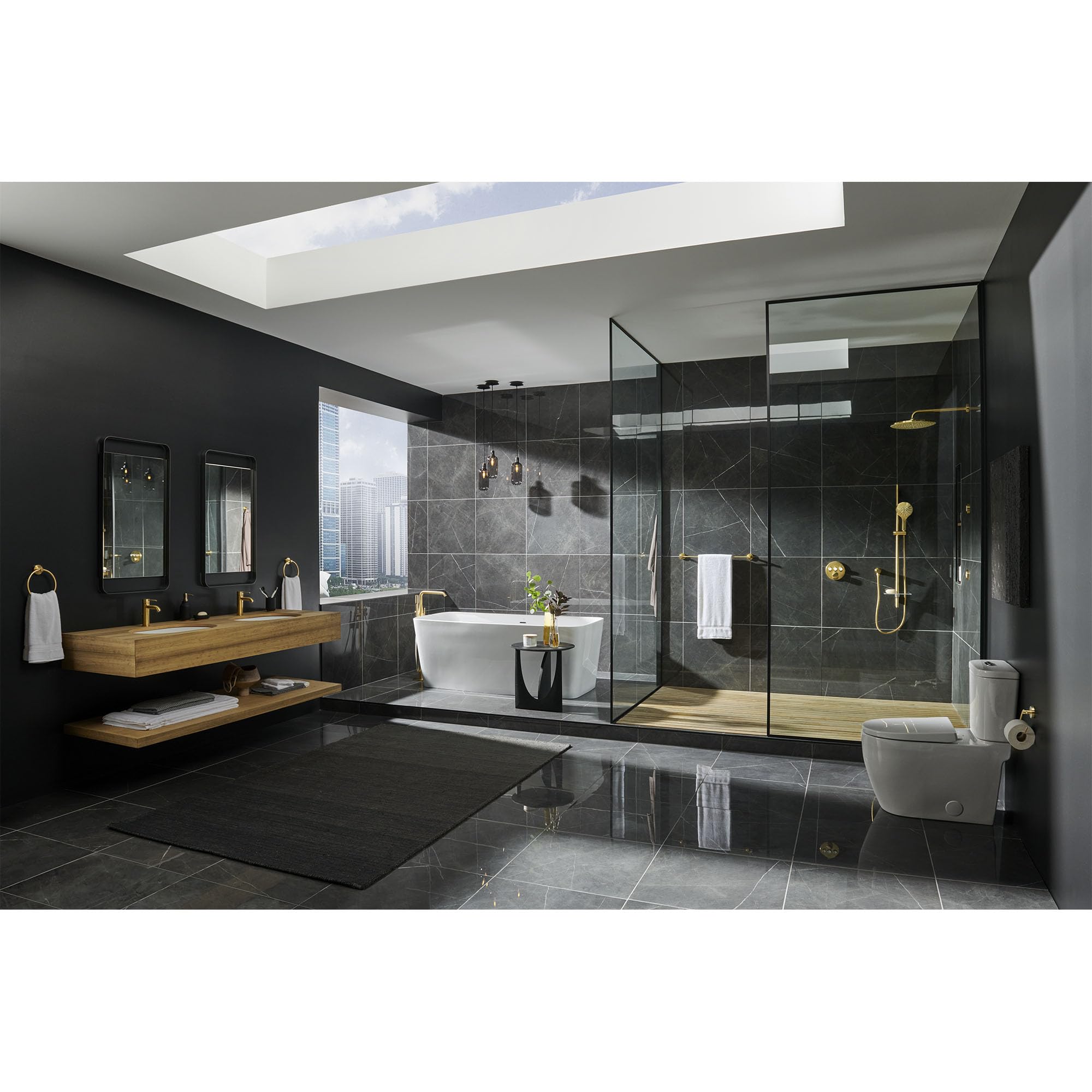 Grohe Essence single-handle bathroom faucet with curved spout in brushed gold finish mounted on wooden vanity.