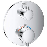 Chrome thermostatic valve trim with two round handles, temperature gauge showing 38°C, and rectangular escutcheon plate.