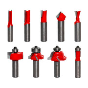 Nine router bits with red cutting heads and gray steel shanks in various profiles including straight, flush trim, roundover, 