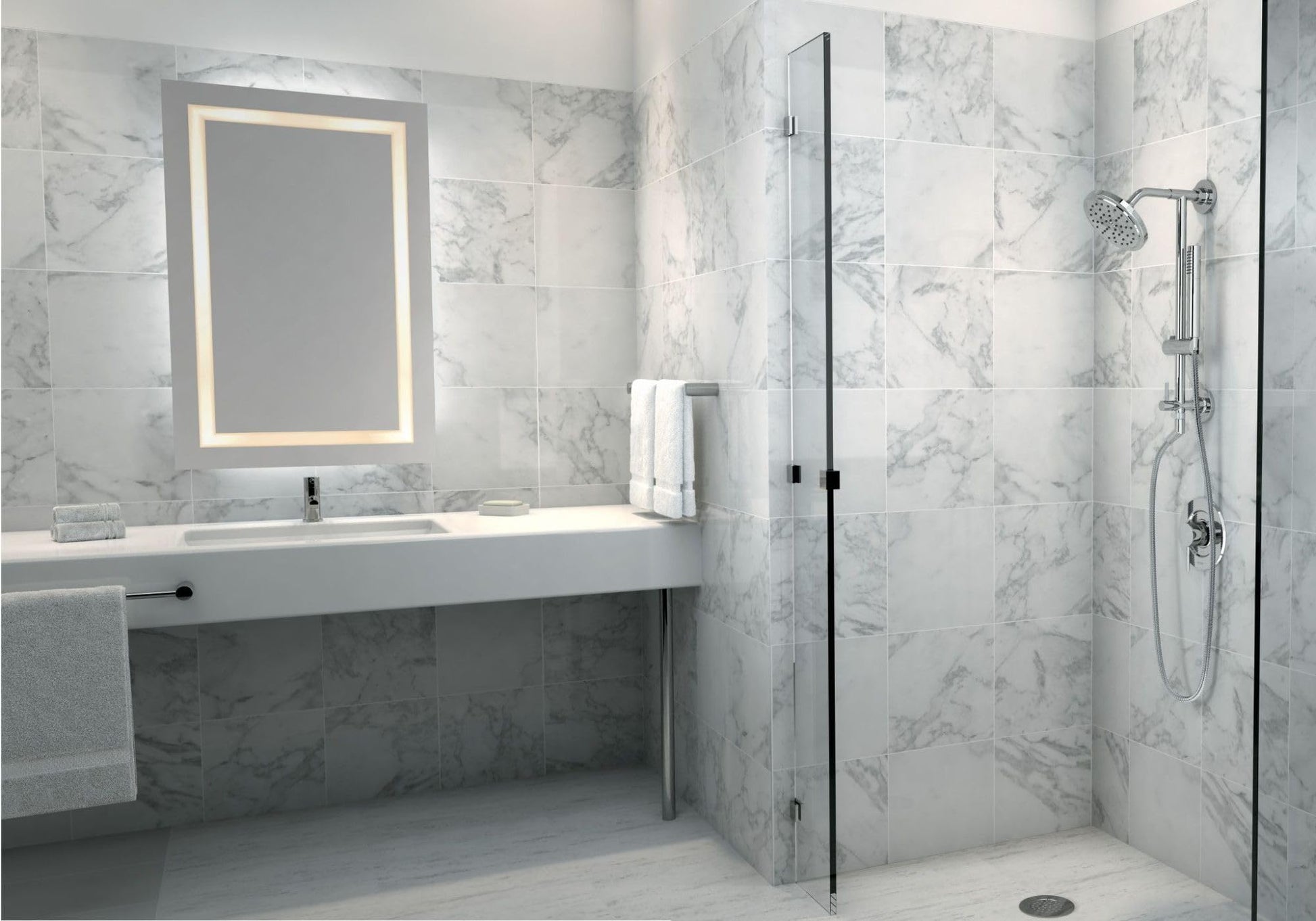 Chrome circular shower head mounted on wall above shower enclosure in marble bathroom.