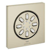 Square brushed nickel body spray with eight oval nozzles arranged in circular pattern and small adjustment jets.
