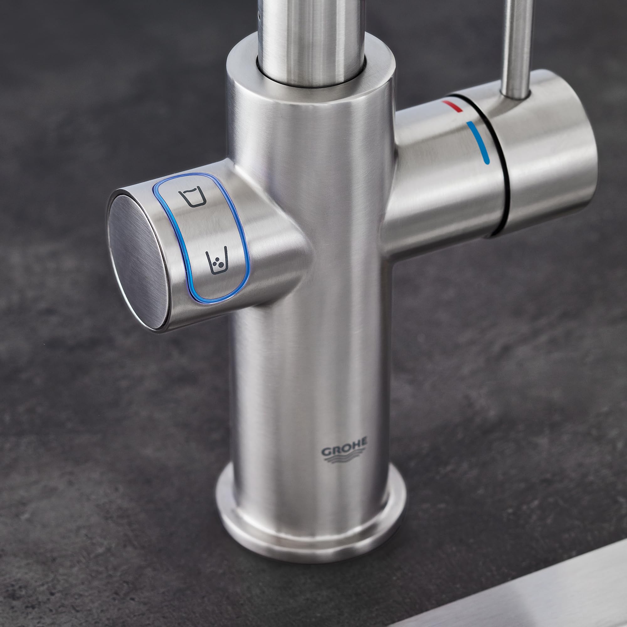 Grohe Supersteel single-handle pull-down kitchen faucet with dual control knobs for water and beverage dispensing.