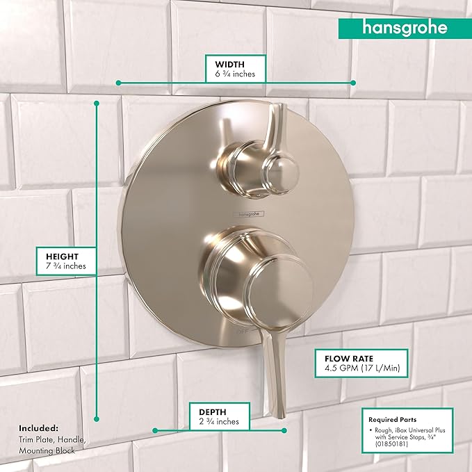 Round polished nickel pressure balance trim with diverter and dual control handles mounted on white subway tile.