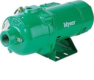 Green cast iron shallow well pump with inlet/outlet ports and motor housing mounted on black base.