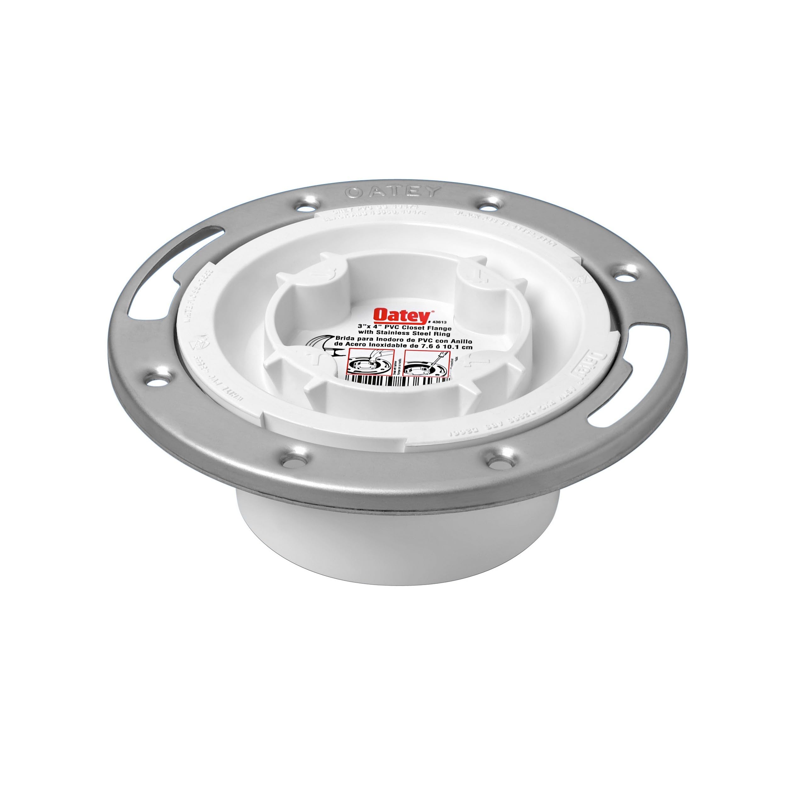 White PVC closet flange with stainless steel ring and mounting holes for toilet installation.