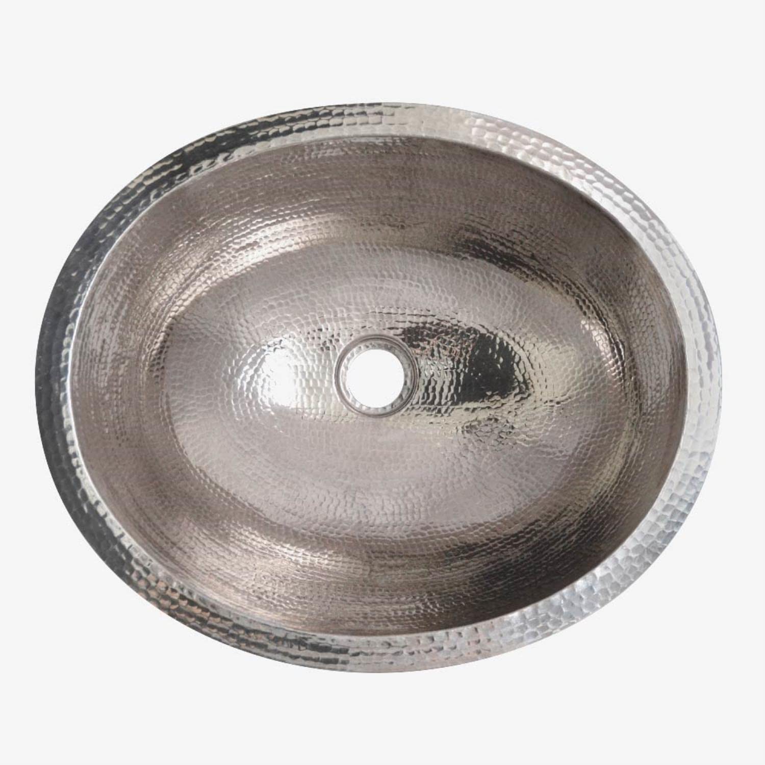 Oval polished nickel sink with hammered texture and single center drain hole, viewed from above.