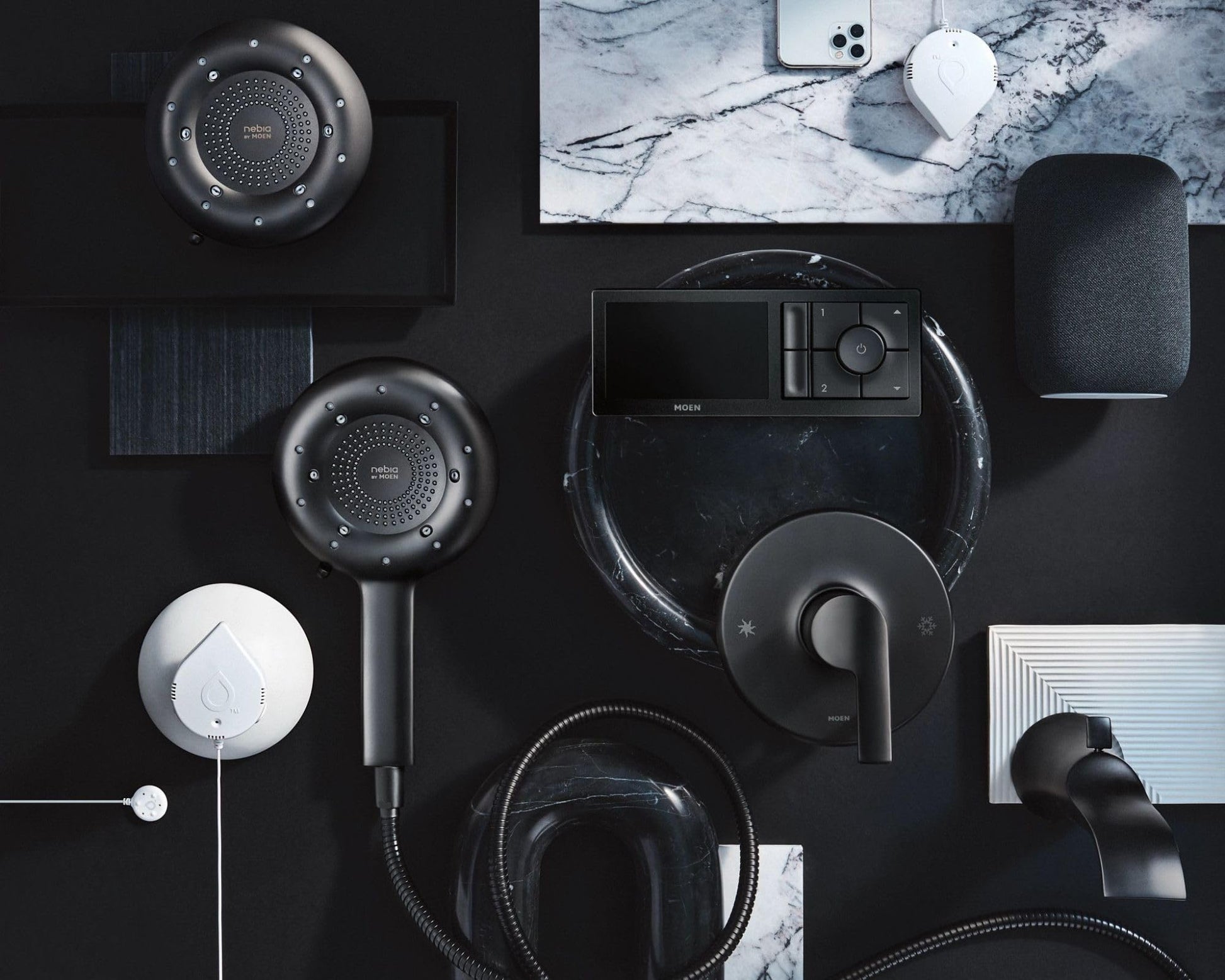 Matte black tub and shower trim kit components including showerhead, handle, spout, and valve displayed on dark background.