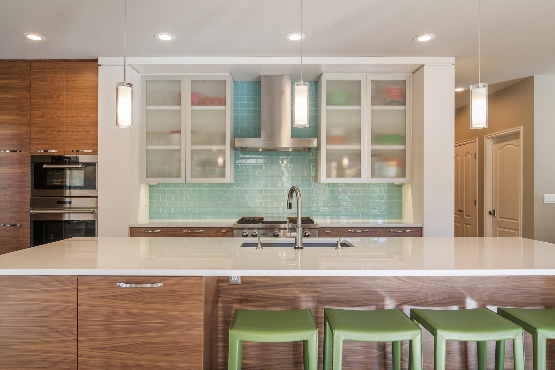 I can see this is a kitchen interior image, but I don't see a soap/lotion dispenser visible in the photo. Could you provide a