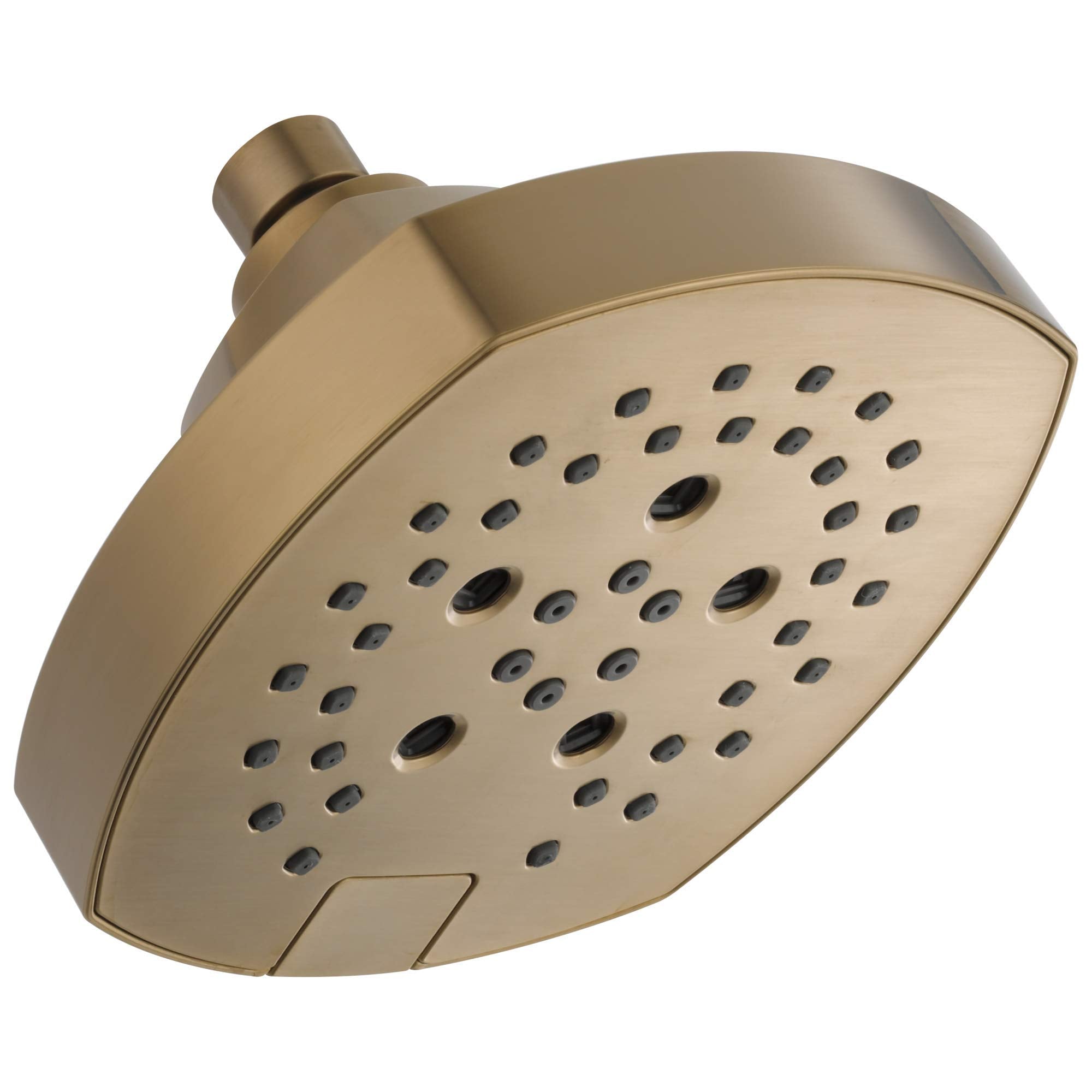 Brushed gold shower head with curved face and multiple spray holes connected to round arm mount.