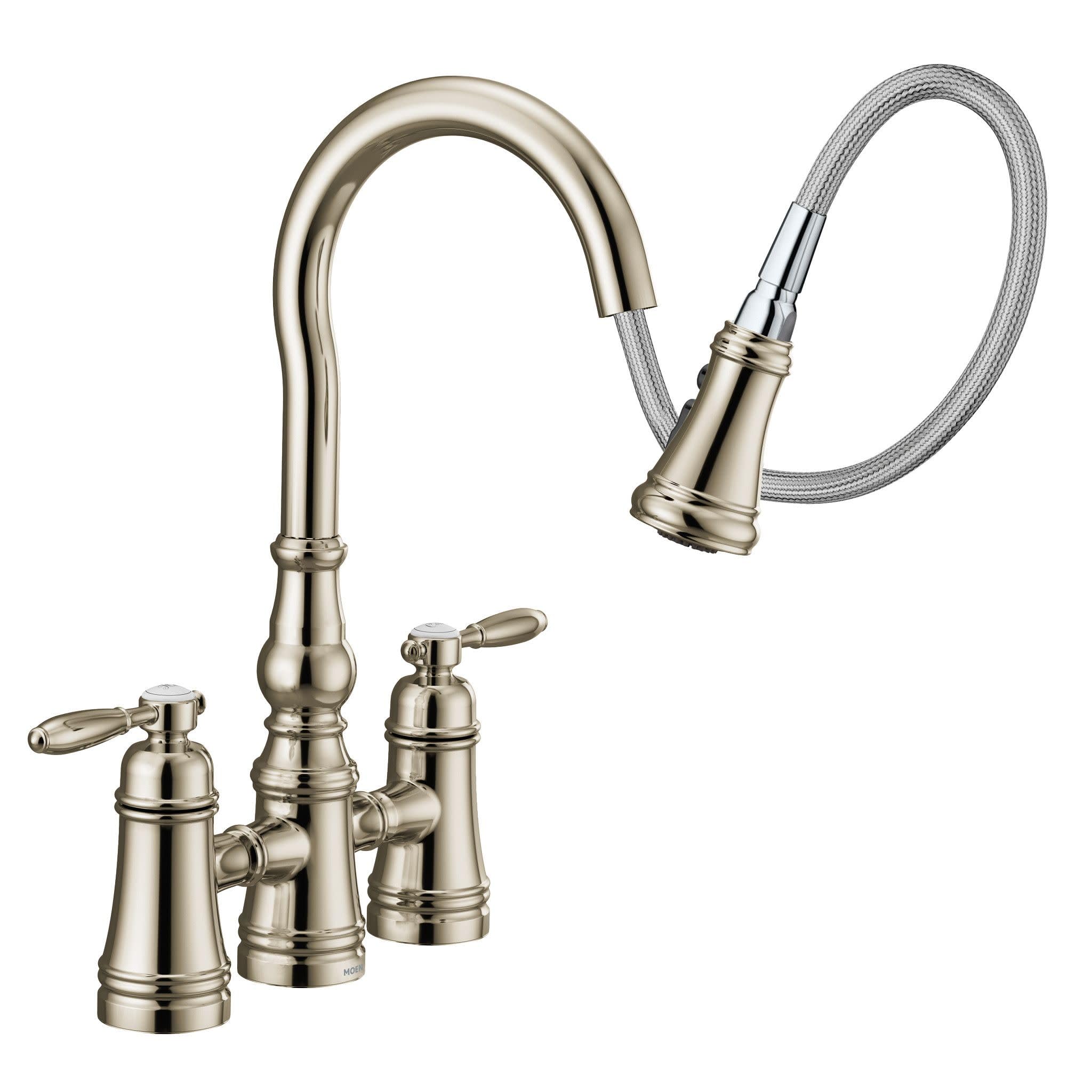 Polished nickel bridge kitchen faucet with curved spout, pulldown spray head, and two lever handles.