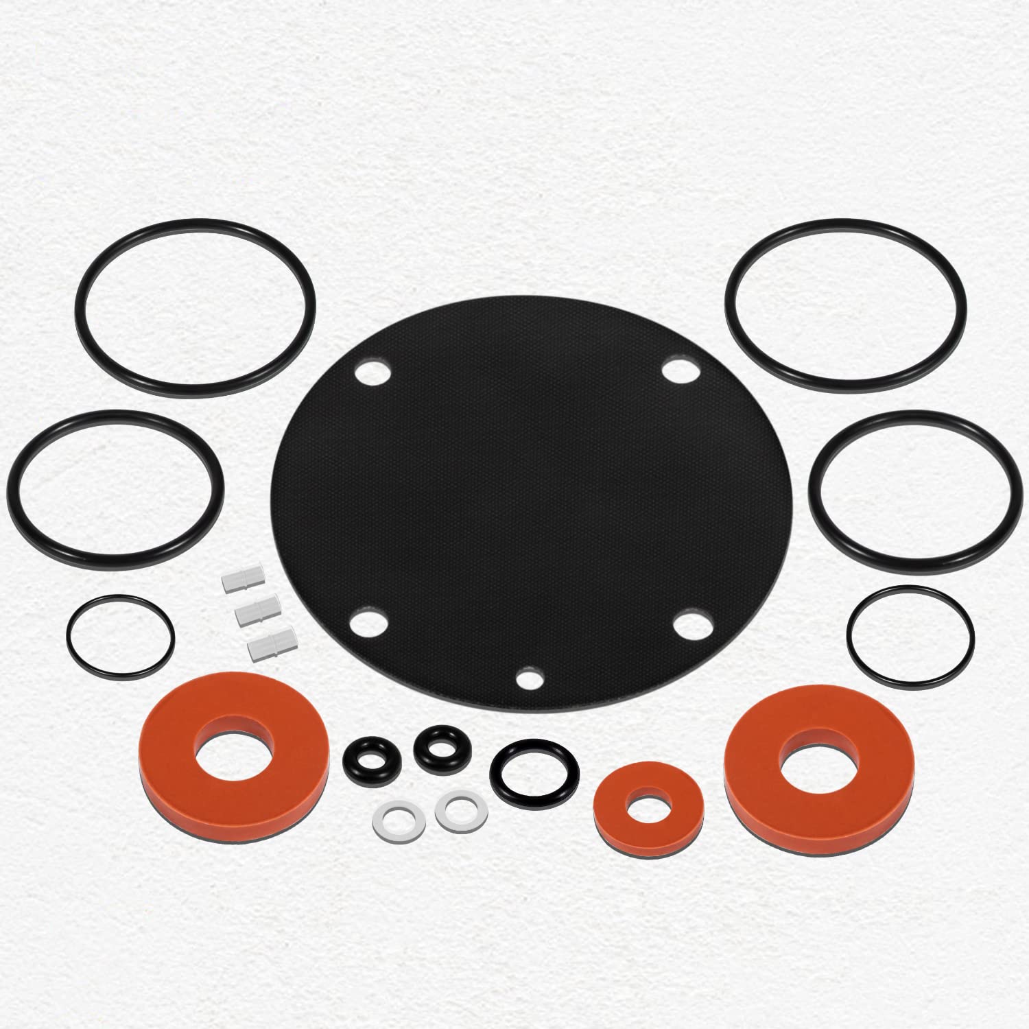 Silicone rubber kit containing black o-rings, black diaphragm, red rubber washers, metal spacers, and small metal fasteners a