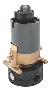 Grohe pressure balance control unit with gray polymer body, brass base, and ribbed adjustment knob on top.