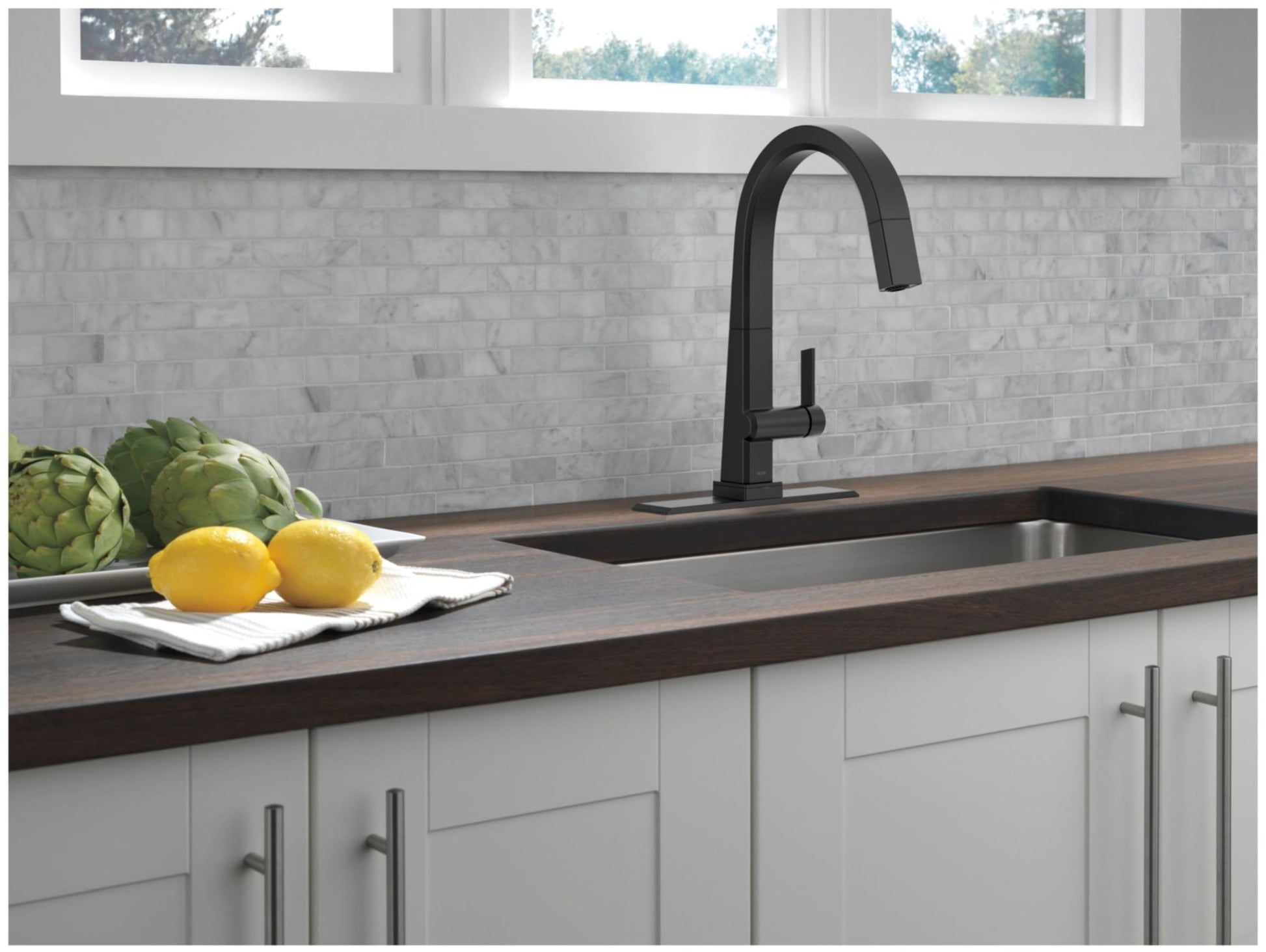 Chrome-finish escutcheon with gasket studs and mounting hardware for 8-inch Delta Pivotal faucet installation.