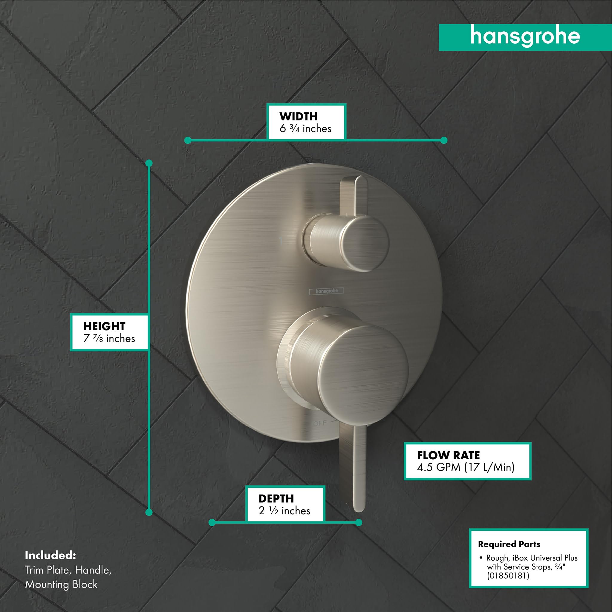 Brushed nickel circular valve trim with two round handles and diverter, mounted on textured dark tile wall.